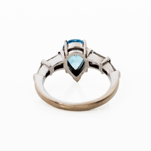 1033 - A BLUE TOPAZ AND DIAMOND RING