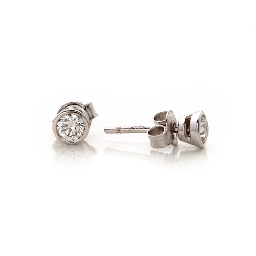 1072 - A PAIR OF DIAMOND EAR STUDS