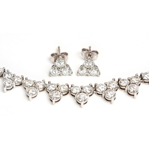 1107 - A DIAMOND NECKLACE WITH MATCHING EARRINGS