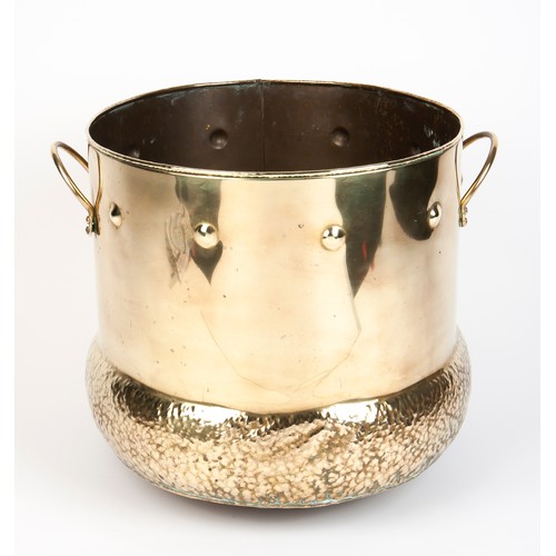 215 - A TWO-HANDLED BRASS BUCKET