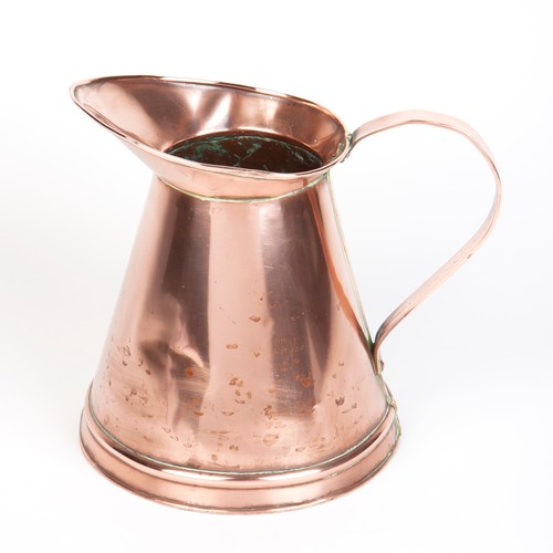 213 - A COPPER MEASURING JUG