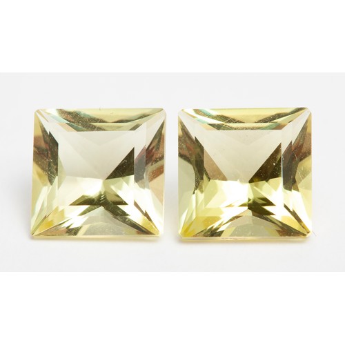 1091 - A PAIR OF PRINCESS-CUT TOPAZ 10 CARATS