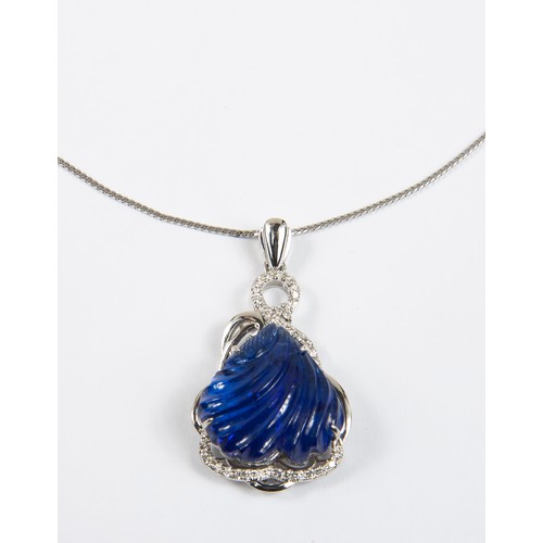 1218 - A TANZANITE PENDANT 42 CARATS