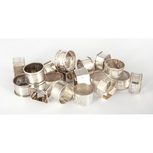 104 - EIGHTEEN SILVER TABLE NAPKIN RINGS