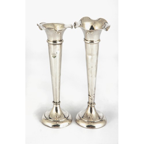 131 - A PAIR OF SILVER VASES