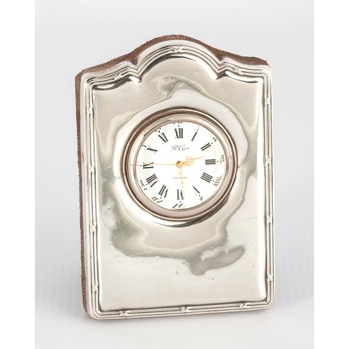 260 - A SILVER TRAVELLING CLOCK