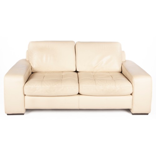 889 - A CREAM COLORED TWO-SEATER SOFA, MODERN