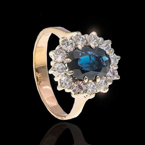 1112 - A SAPPHIRE AND DIAMOND RING