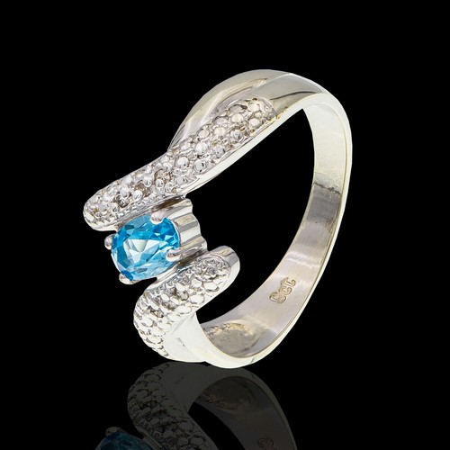 1117 - A TOPAZ AND DIAMOND DRESS RING