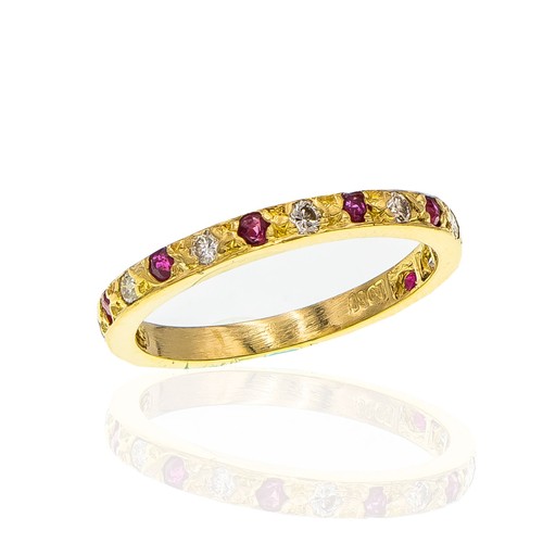 1148 - A RUBY AND DIAMOND ETERNITY RING