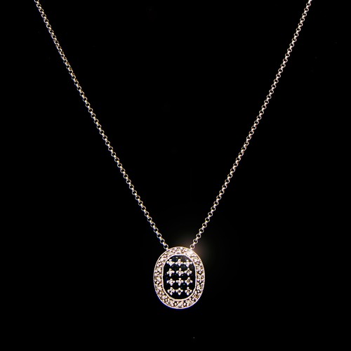 1203 - A SAPPHIRE AND DIAMOND DRESS PENDANT