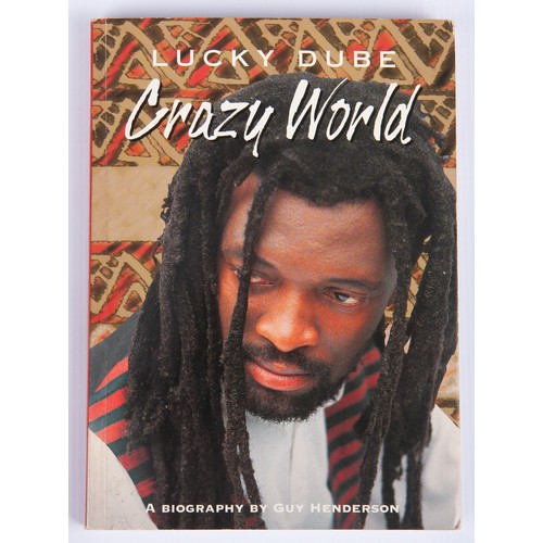 322 - LUCKY DUBE: CRAZY WORLD, A BIOGRAPHY (INSCRIBED BY LUCKY DUBE)