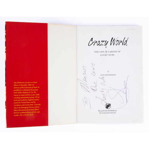 322 - LUCKY DUBE: CRAZY WORLD, A BIOGRAPHY (INSCRIBED BY LUCKY DUBE)