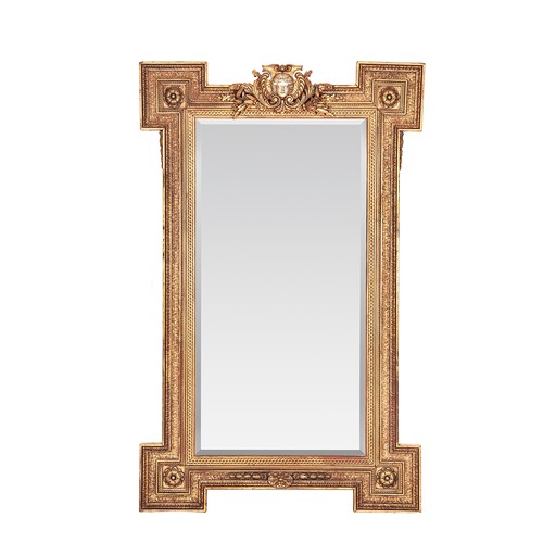 870 - A CARVED GILT-WOOD WALL MIRROR