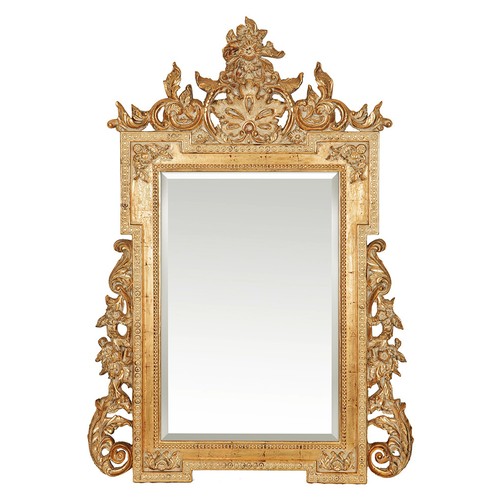 867 - A CARVED GILT-WOOD OVER MANTEL MIRROR