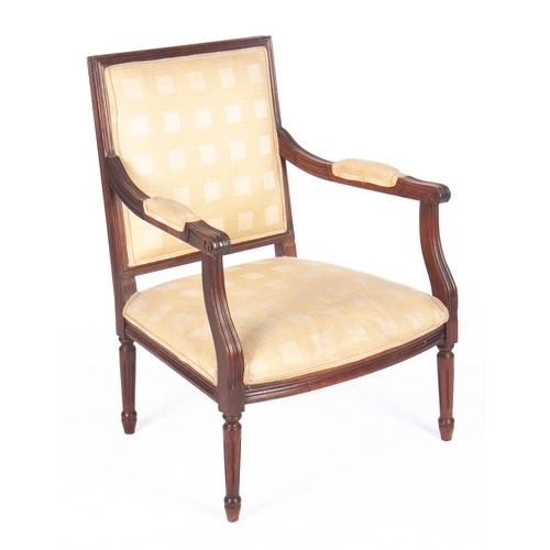 876 - AN ARM CHAIR