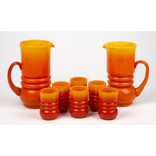 522 - A PART-SUITE OF ORANGE AND YELLOW GLASSWARE