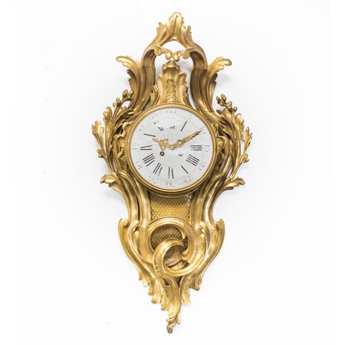 256 - A FRENCH-STYLE GILT METAL CLOCK