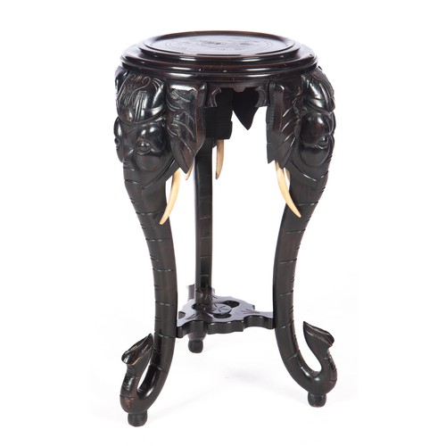 154 - AN EBONISED PLANT STAND