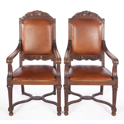 213 - A SET OF TEN LEATHER-UPHOLSTERED MAHOGANY DINING CHAIRS