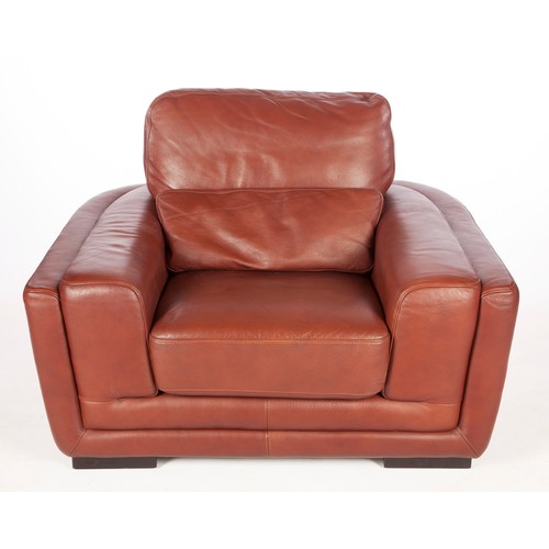 207 - A LEATHER-UPHOLSTERED CLUB ARMCHAIR