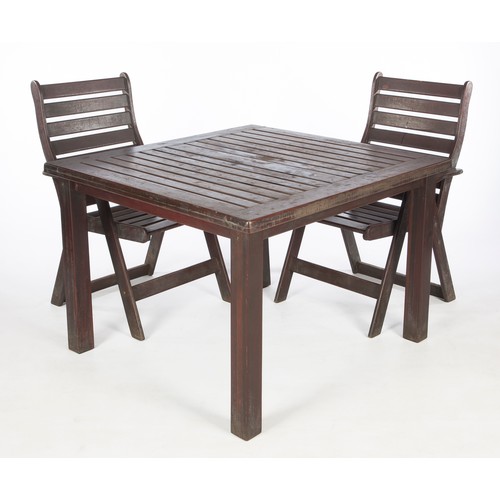 247 - A BLACK-PAINTED WOODEN GARDEN TABLE