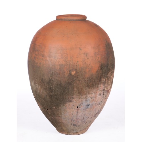 84 - AN OVOID TERRACOTTA JAR