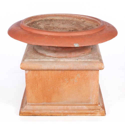 70 - A CIRCULAR TERRACOTTA BIRD BATH