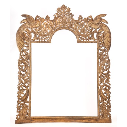 220 - A SHAPED RECTANGULAR GILT-WOOD FRAME 