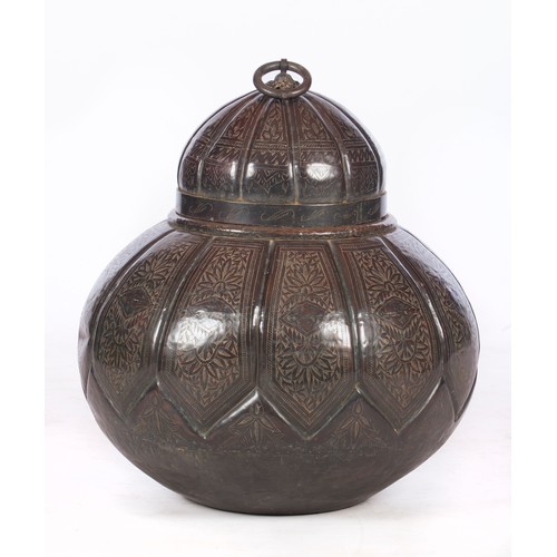 65 - AN OTTOMAN-STYLE METAL CONTAINER AND COVER