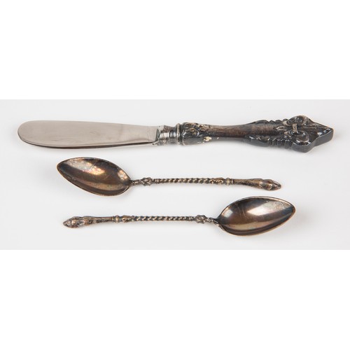 30 - A BUTTER KNIFE AND A PAIR OF TEA SPOONS