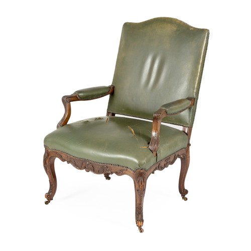 103 - A VICTORIAN MAHOGANY AND LEATHER UPHOLSTERED ARMCHAIR