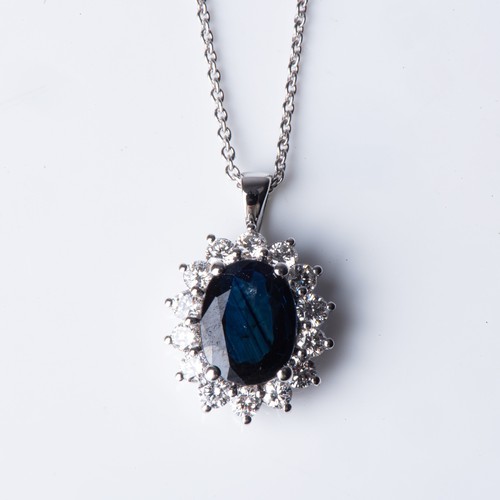 168 - A SAPPHIRE AND DIAMOND PENDANT