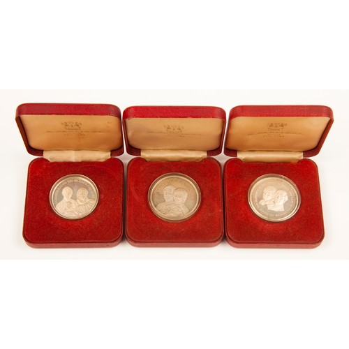 93 - THREE CASED SILVER COINS