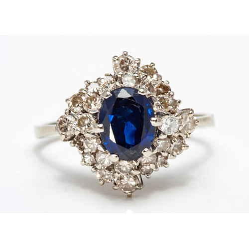 171 - A SAPPHIRE AND DIAMOND DRESS RING