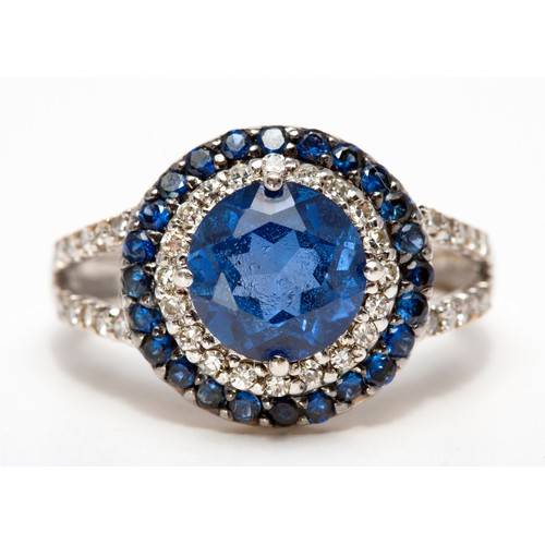 288 - A DIAMOND AND GEMSTONE DRESS RING