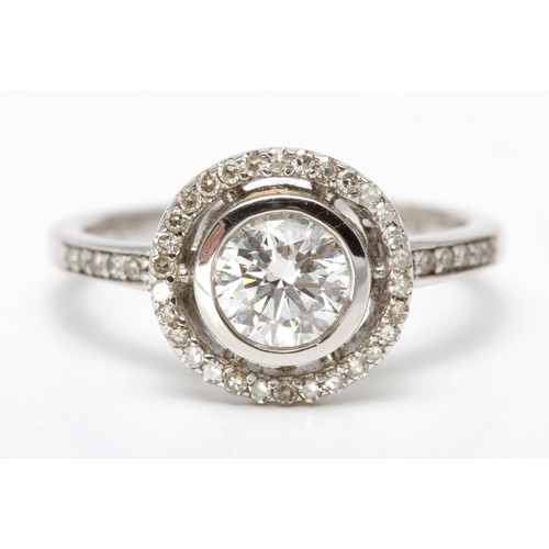 144 - A DIAMOND DRESS RING