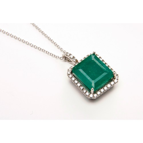 175 - AN EMERALD AND DIAMOND PENDANT