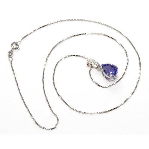 180 - A TANZANITE AND DIAMOND PENDANT