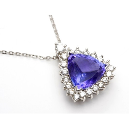 181 - A TANZANITE AND DIAMOND PENDANT