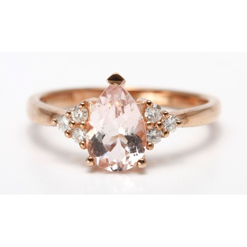 188 - A MORGANITE AND DIAMOND DRESS RING