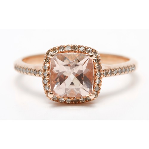 190 - A MORGANITE AND DIAMOND DRESS RING