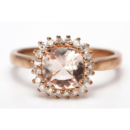 192 - A MORGANITE AND DIAMOND DRESS RING