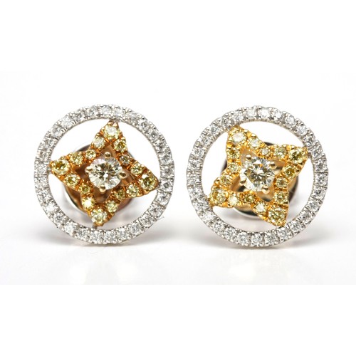 214 - A PAIR OF DIAMOND EARRINGS