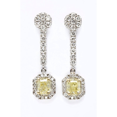 216 - A PAIR OF DESIGNER DIAMOND EARRINGS