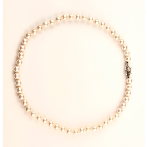 230 - A PEARL AND DIAMOND NECKLACE