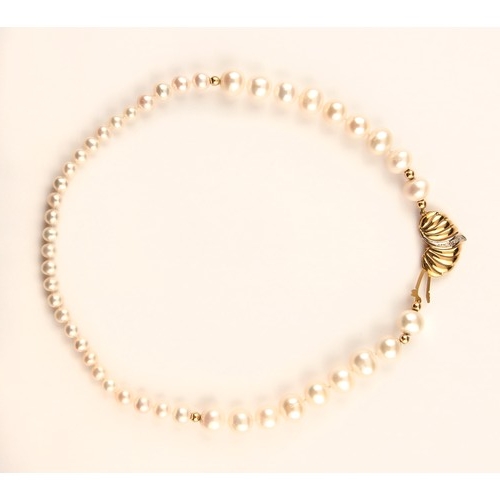 232 - A BEADED PEARL NECKLACE