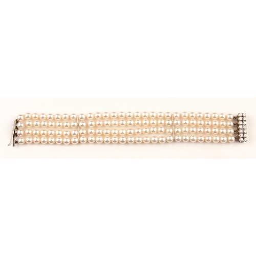 233 - A PEARL AND DIAMOND BRACELET