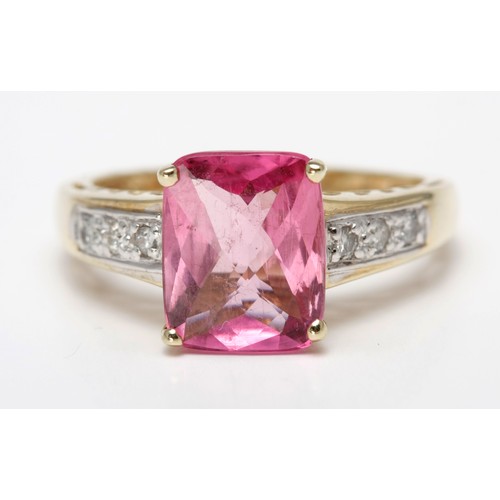 264 - A PINK TOPAZ AND DIAMOND DRESS RING