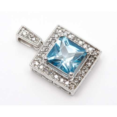 266 - A TOPAZ AND DIAMOND PENDANT